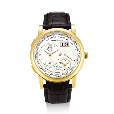 View full screen - View 1 of Lot 2157. A. LANGE & SÖHNE | LANGE 1, REFERENCE 116.021 A YELLOW GOLD DUAL TIME ZONE WRISTWATCH WITH DATE, POWER RESERVE AND DAY AND NIGHT INDICATION, CIRCA 2010" | 朗格 | Lange 1 型號116.021 黃金兩地時間腕錶,備日期、動力儲備及晝夜顯示,機芯編號50505,錶殼編號160386,約2010年製".