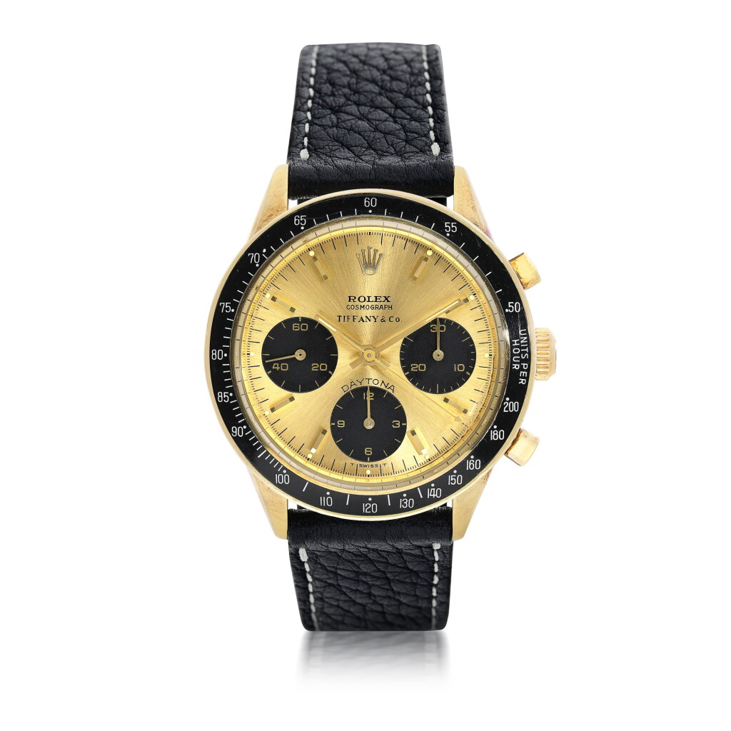 View full screen - View 1 of Lot 2. ROLEX | REFERENCE 6238 TRANSITIONAL DAYTONA RETAILED BY TIFFANY & CO.: AN EXTREMELY FINE AND RARE YELLOW GOLD CHRONOGRAPH WRISTWATCH WITH REGISTERS, CIRCA 1967.