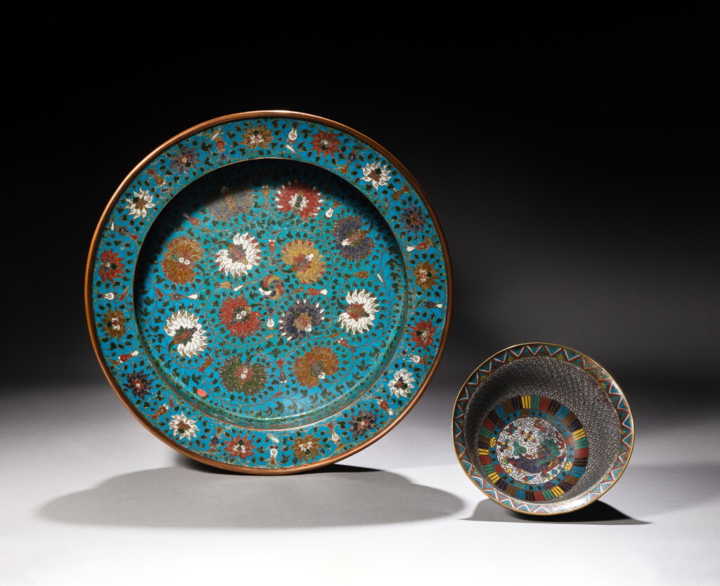 View full screen - View 1 of Lot 44. A large cloisonné enamel 'lotus' charger and a 'lion' deep bowl, Ming and Qing dynasties | 明及清 掐絲琺瑯獅紋大盌及掐絲琺瑯蓮紋大盤一組兩件.