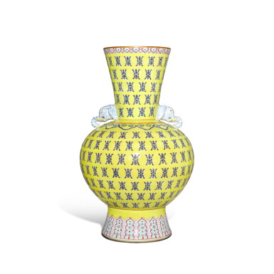 View full screen - View 1 of Lot 761. A yellow-ground famille-rose 'elephant' handled vase, Mark and period of Tongzhi | 清同治 黃地粉彩百壽紋象耳瓶 《同治年製》款.
