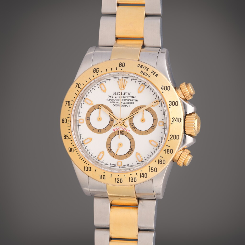 View full screen - View 1 of Lot 336. Reference 116523 Daytona | A stainless steel and yellow gold automatic chronograph wristwatch with bracelet, Circa 2004.