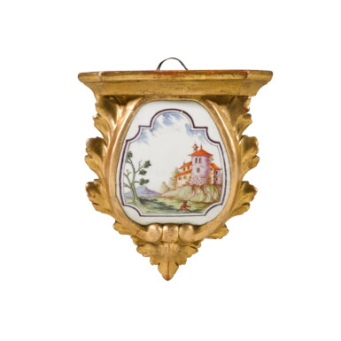 View full screen - View 1 of Lot 164. A porcelain mounted giltwood and gesso wall bracket, the porcelain Du Paquier circa 1740.