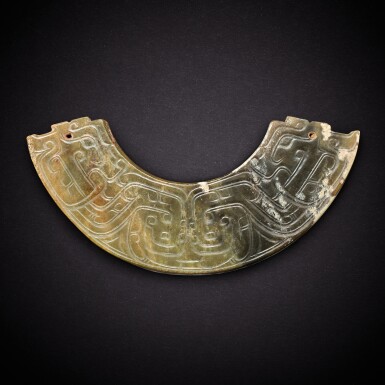 View full screen - View 1 of Lot 3495. A celadon jade 'human and dragon' pendant, huang, Western Zhou dynasty | 西周 青玉人龍紋璜.