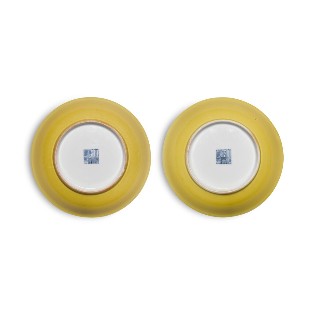 View full screen - View 1 of Lot 239. A pair of yellow-glazed dishes, Seal Marks and period of Qianlong | 清乾隆 黃釉盤一對 《大清乾隆年製》款.