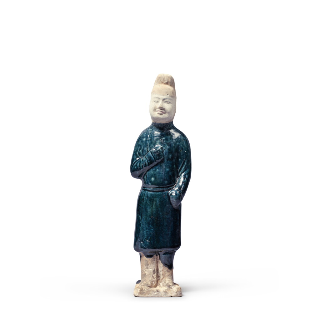 View full screen - View 1 of Lot 751. A rare blue-glazed pottery figure of a groom, Tang dynasty | 唐 藍釉陶俑.