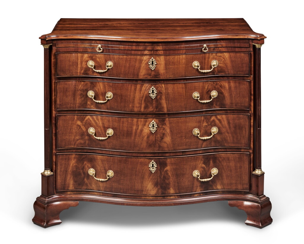 View full screen - View 1 of Lot 302. A George III Mahogany Serpentine Chest-of-Drawers, Circa 1765.