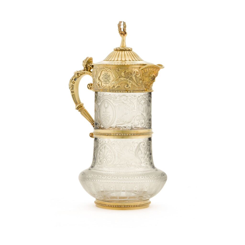 View full screen - View 1 of Lot 74. A Victorian silver-gilt-mounted glass claret jug, William & George Sissons, Sheffield, 1869.