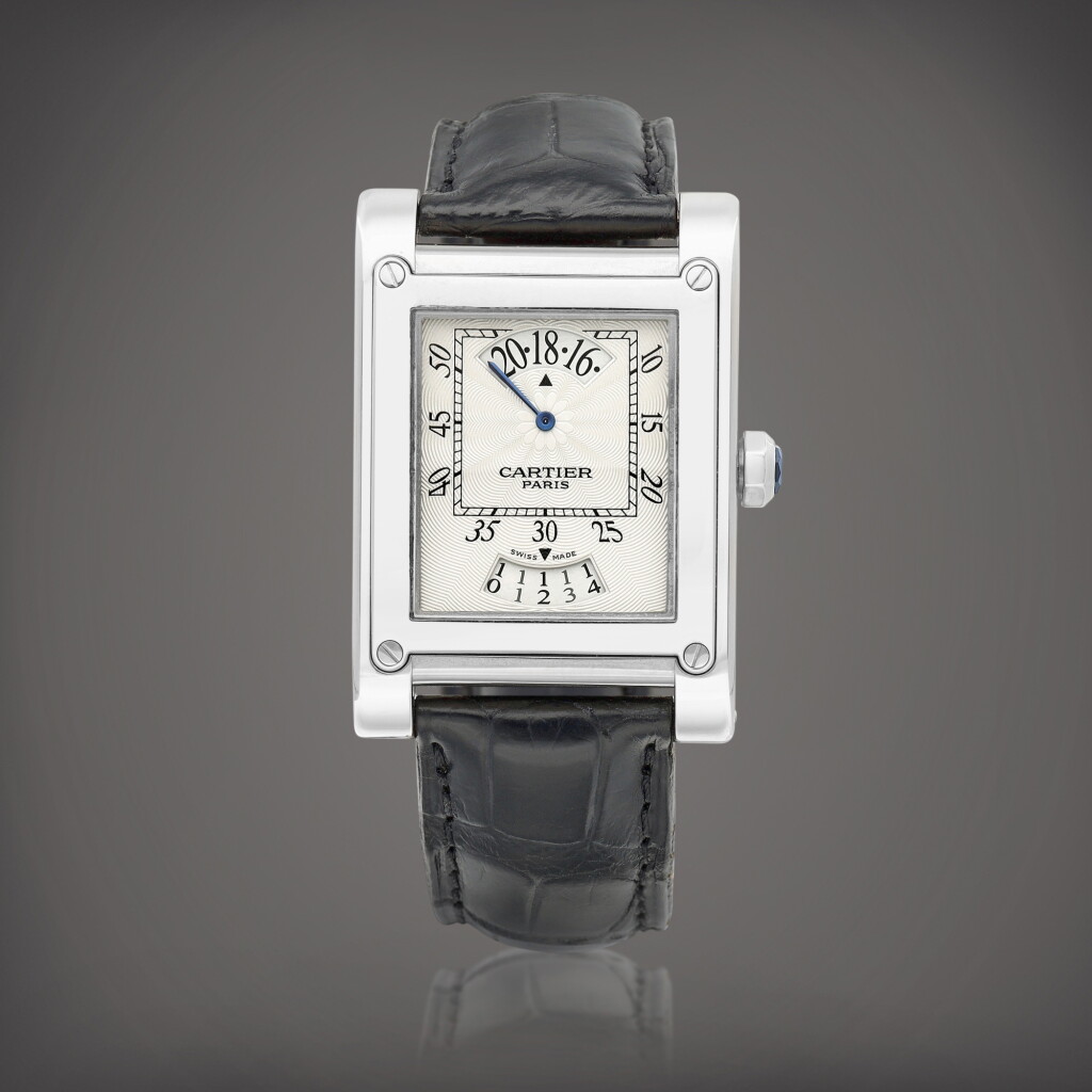 View full screen - View 1 of Lot 2142. Tank À Vis "CPCP", Reference 2554 | A white gold wristwatch with date and wandering hours, Circa 2006 | 卡地亞 | Tank À Vis "CPCP" 型號2554 | 白金腕錶,備日期及漫遊小時顯示,約2006年製.