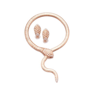 View full screen - View 1 of Lot 621. Gold and diamond necklace, 'Serpenti', Bulgari, and a pair of ear clips.