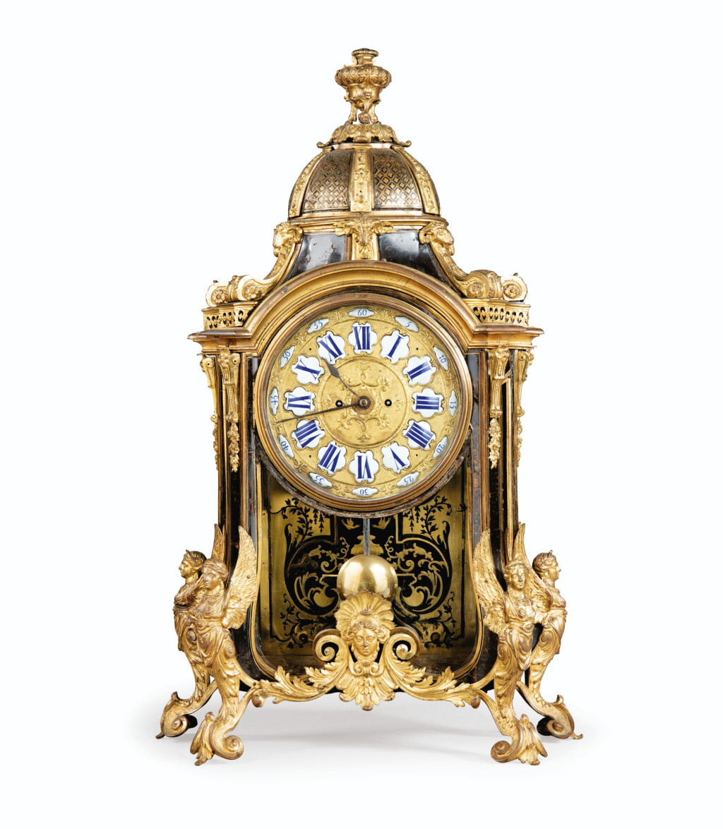 View full screen - View 1 of Lot 25. A RÉGENCE GILT-BRONZE MOUNTED TORTOISESHELL MARQUETRY CARTEL CLOCK AFTER A MODEL BY ANDRÉ-CHARLES BOULLE | CARTEL AUX HARPIES EN PLACAGE D'ÉCAILLE BRUNE ET BRONZE DORÉ D'ÉPOQUE RÉGENCE D'APRÈS UN MODÈLE ATTRIBUÉ À ANDRÉ-CHARLES BOULLE.