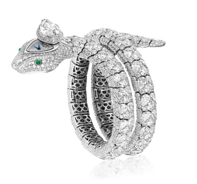 View full screen - View 1 of Lot 17. GRAFF | DIAMOND AND EMERALD 'SERPENTINE' BRACELET-WATCH 格拉夫 | 鑽石配祖母綠「Serpentine」手鏈腕錶.
