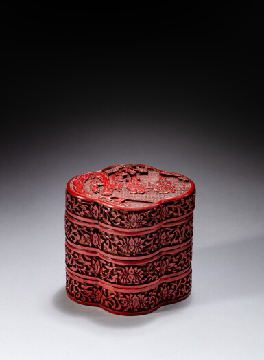 View full screen - View 1 of Lot 48. A carved cinnabar lacquer three-tiered box and cover, Ming dynasty, 16th - 17th century | 明十六至十七世紀 剔紅人物圖三層蓋盒.