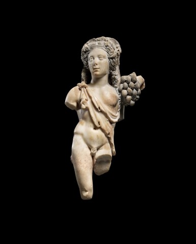 View full screen - View 1 of Lot 179. A Roman Marble Figure of Dionysos, Eastern Mediterranean, circa early 3rd Century A.D..