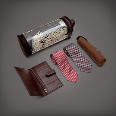 View full screen - View 1 of Lot 834. A set of two silk ties, leather passport holder, umbrella and wool blanket, Circa 2007 to 2019 | 百達翡麗 | 一套兩條真絲領帶、皮製護照套、雨傘及毛毯,約2007到2019年製.