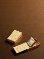 An unusual yellow gold purse watch with a sliding cover and articulated, sprung inner case, Circa 1955