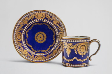 View full screen - View 1 of Lot 681. A Sèvres Porcelain Blue-Ground Cup and Saucer (Gobelet litron et soucoupe), circa 1780.