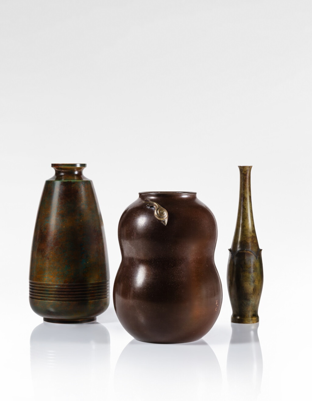 View full screen - View 1 of Lot 58. A group of three bronze vases, Japan, Meiji - Taisho period.