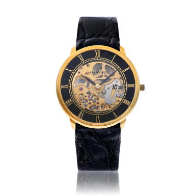 View full screen - View 1 of Lot 249. A yellow gold and enamel skeletonized wristwatch, Circa 1990.