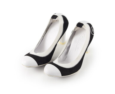 View full screen - View 1 of Lot 9. CHANEL | PAIR OF BLACK SUEDE AND WHITE LEATHER PUMPS .