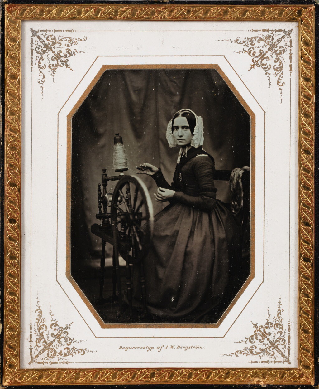 View full screen - View 1 of Lot 3. JOHAN WILHELM BERGSTRÖM | PORTRAIT OF THE PHOTOGRAPHERS WIFE AT THE SPINNING WHEEL, 1844-1852.