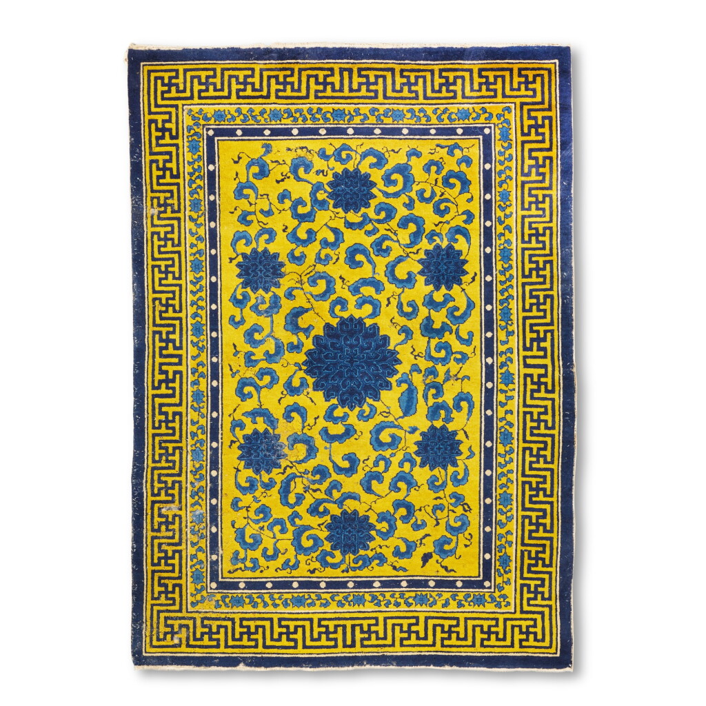 View full screen - View 1 of Lot 282. A yellow-ground 'lotus' carpet, 19th / 20th century | 十九 / 二十世紀 黃地纏枝蓮紋絲絨地毯.