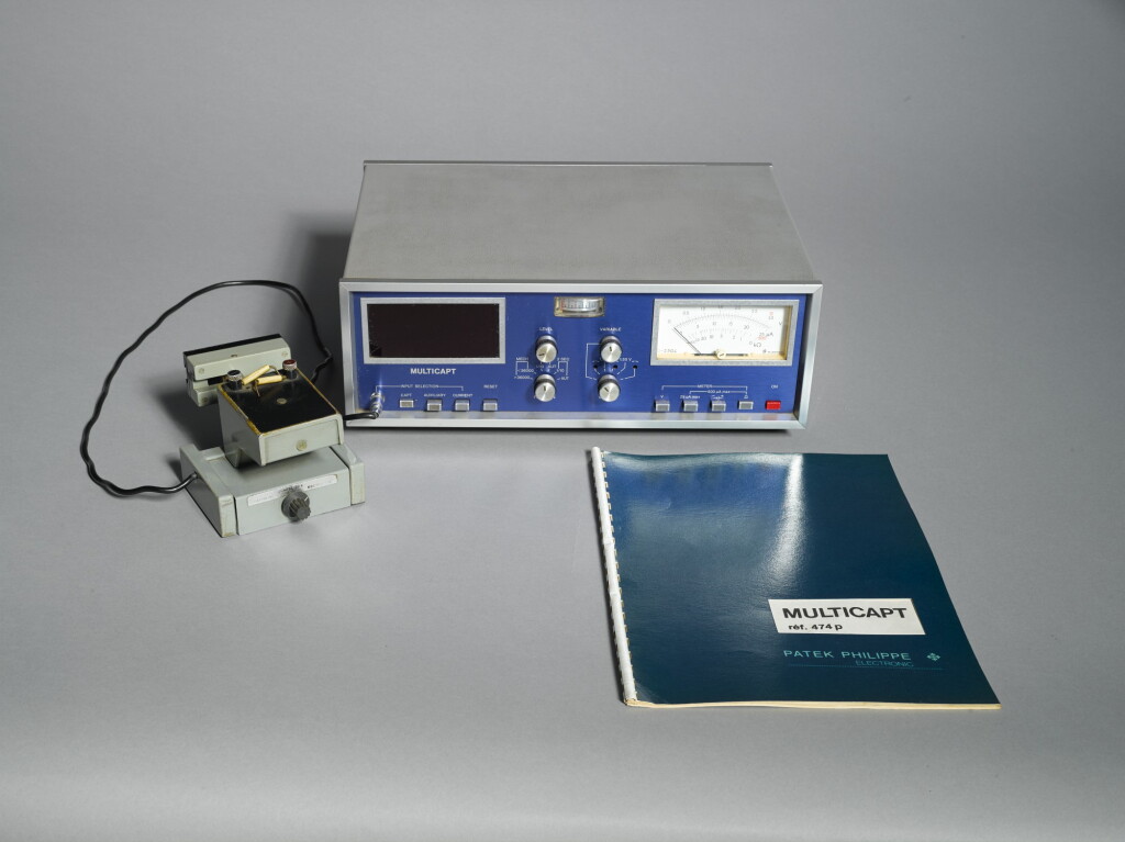 View full screen - View 1 of Lot 220. PATEK PHILIPPE | REFERENCE 474P MULTICAPT A NIXIE TIME-CODE GENERATOR MODULE WITH VOLTMETER AND INSTRUCTION MANUAL, CIRCA 1970'S.