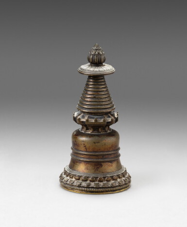 View full screen - View 1 of Lot 109. A copper-alloy stupa Tibet, 13th century | 西藏 十三世紀 銅合金佛塔.