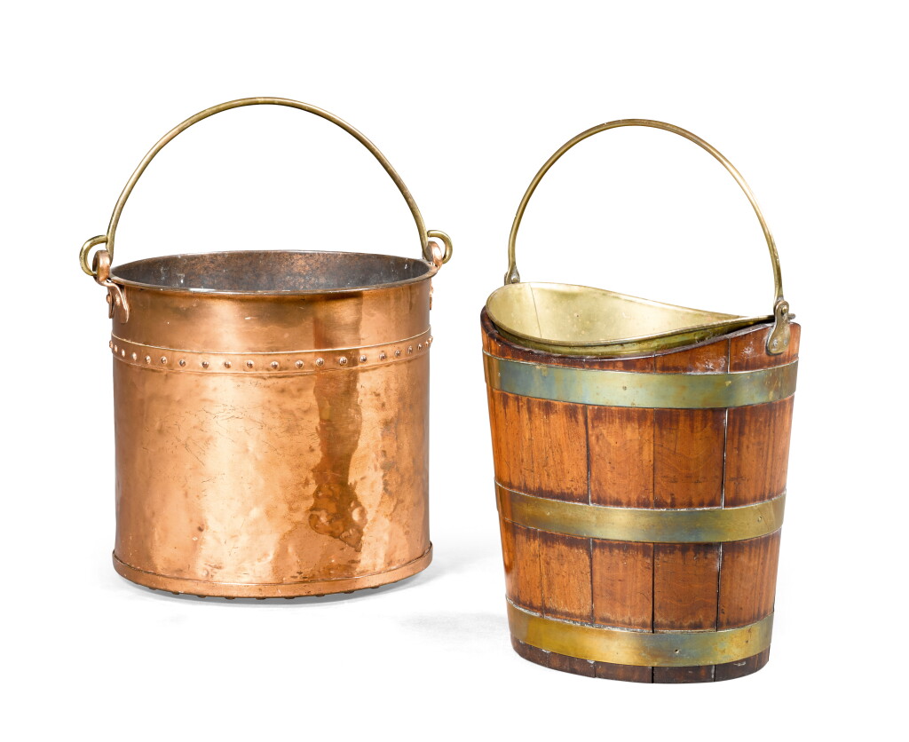 View full screen - View 1 of Lot 30. A George III brass bound mahogany peat bucket, circa 1780, together with a riveted copper fire basket.