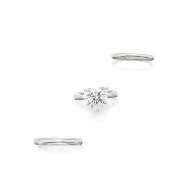 View full screen - View 1 of Lot 416. Tiffany & Co. | Diamond Ring and Two Platinum Bands.