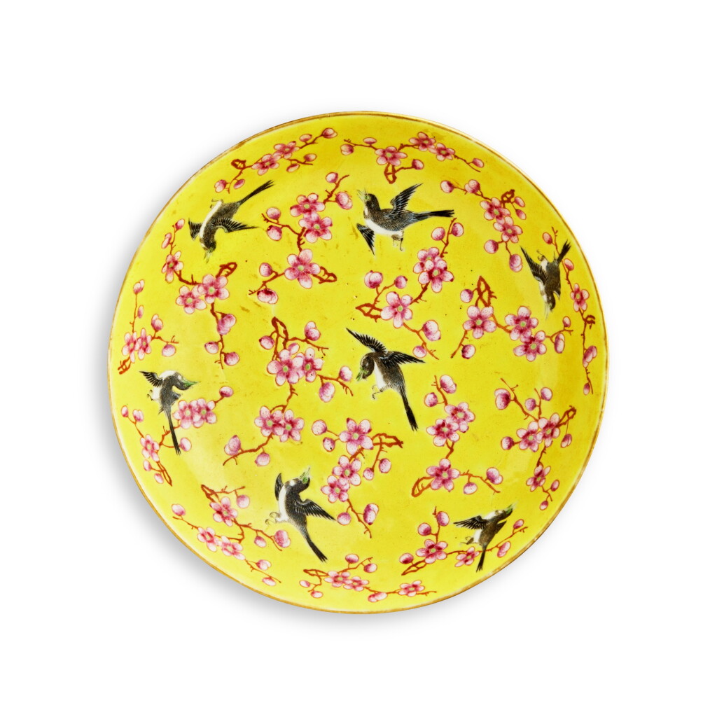 View full screen - View 1 of Lot 1013. A yellow-ground famille-rose 'magpie and prunus' dish, 19th / 20th century | 十九 / 二十世紀 黃地粉彩喜上眉梢紋盤 《大清雍正年製》仿款.