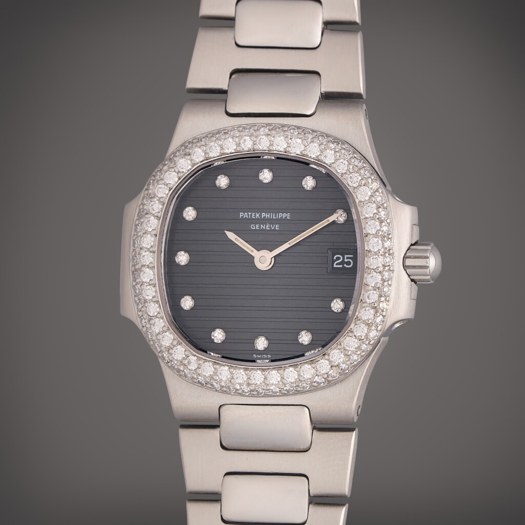 View full screen - View 1 of Lot 182. Reference 4700/4 Nautilus | A platinum and diamond-set wristwatch with date and bracelet, Circa 1985.