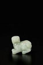 A celadon jade figure of a mythical beast, 17th / 18th century