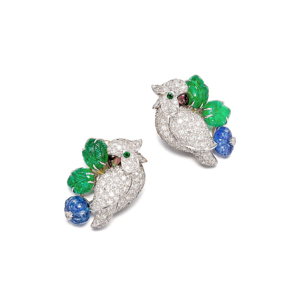View full screen - View 1 of Lot 214. 'Les Oiseaux Libérés' Diamond, Emerald, Sapphire and Mother-Of-Pearl Ear Clips | 卡地亞 | 'Les Oiseaux Libérés' 鑽石,祖母綠 及 藍寶石 配 貝母 耳夾一對.
