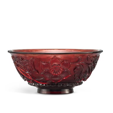 View full screen - View 1 of Lot 561. A carved ruby-red glass 'lotus' bowl, Qing dynasty, Qianlong period 清乾隆 寶石紅料雕纏枝蓮紋盌.