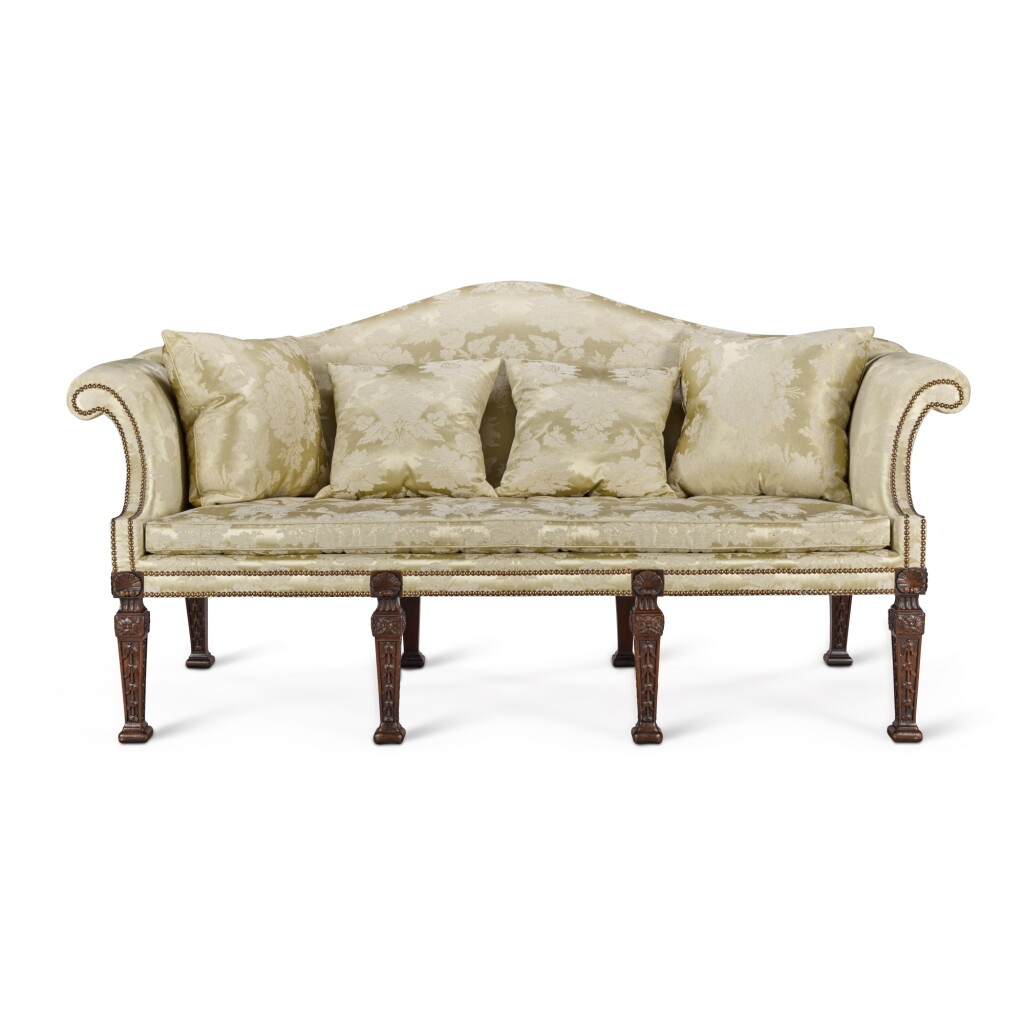 View full screen - View 1 of Lot 49. A George II mahogany sofa, circa 1740, after William Kent.