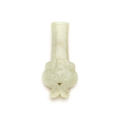 View full screen - View 1 of Lot 256. A BROWNISH-GREEN 'ELEPHANT-HEAD' BOTTLE VASE, 17TH/18TH CENTURY | 十七/十八世紀 青白玉象首小瓶.