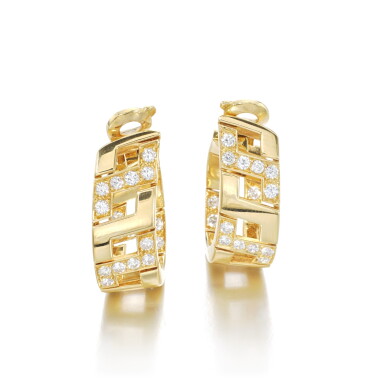 View full screen - View 1 of Lot 1212. Pair of gold and diamond ear clips.