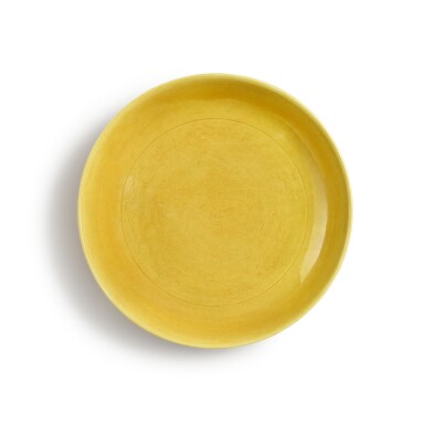 View full screen - View 1 of Lot 222. An incised yellow-glazed 'dragon' dish, Seal mark and period of Daoguang.