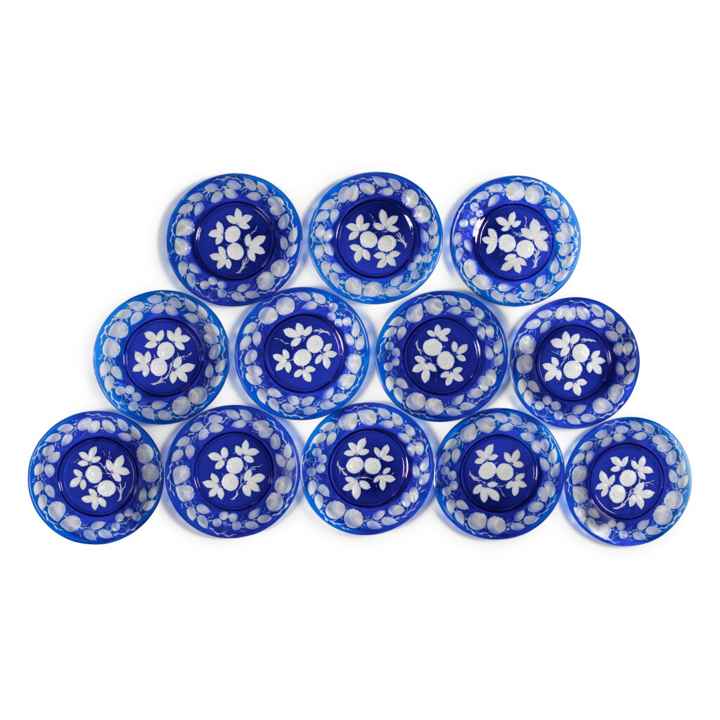 View full screen - View 1 of Lot 42. A Set of Twelve Continental Blue Overlay Glass Plates, Late 19th/Early 20th Century.