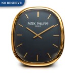 Inducta manufacture for Patek Philippe, A gilt wall clock, Circa 1990 | Inducta manufacture 為百達翡麗而製 | 鍍金銅製掛牆鐘,約1990年製