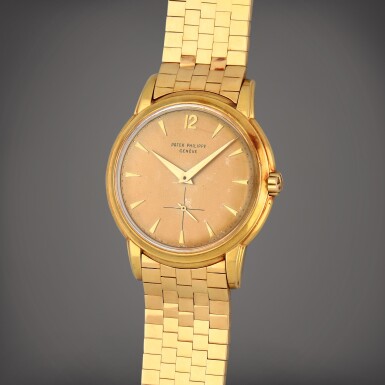View full screen - View 1 of Lot 229. Reference 2551 | A yellow gold wristwatch with bracelet | Circa 1959.