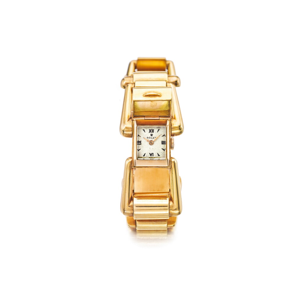 View full screen - View 1 of Lot 1076. ROLEX | REF 4005, A PINK GOLD CONCEALED BRACELET WATCH, CIRCA 1940 | 勞力士 |4005型號粉紅金隱藏式鍊帶腕錶,年份約1940.