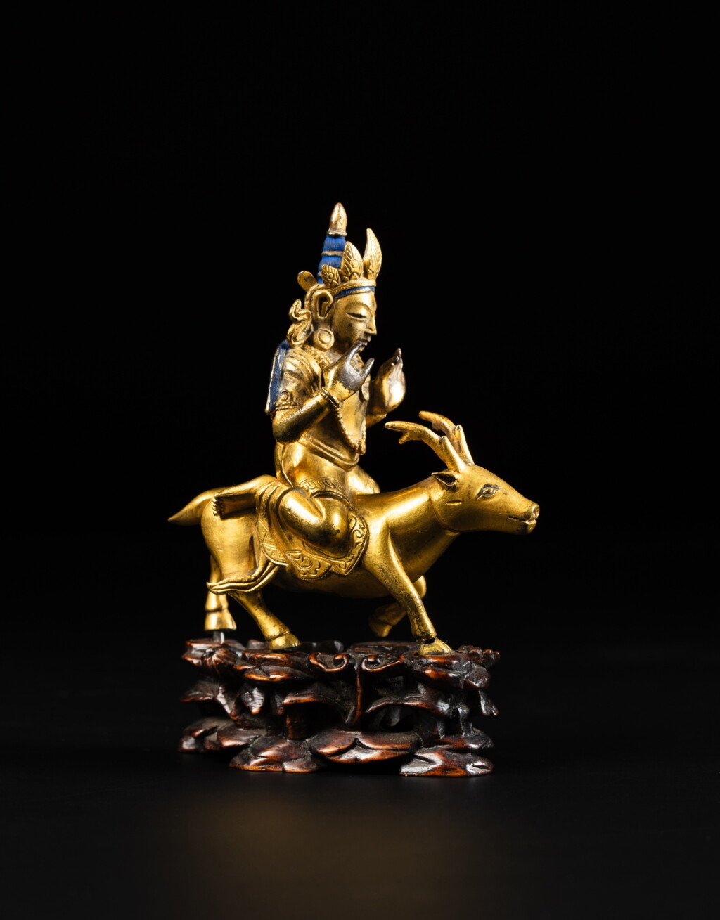View full screen - View 1 of Lot 20. A gilt-bronze figure of Vayu Deva, Qing dynasty, late 18th century | 清十八世紀末 鎏金銅伐由坐像.