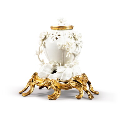 View full screen - View 1 of Lot 439. A Louis XV gilt-bronze mounted Saint-Cloud porcelain pot-pourri jar and cover, circa 1730.