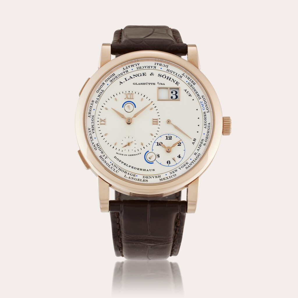 View full screen - View 1 of Lot 112. Reference 116.050 Lange 1 Time Zone | A limited edition honeygold world time wristwatch with date and day/night indication, Circa 2016.