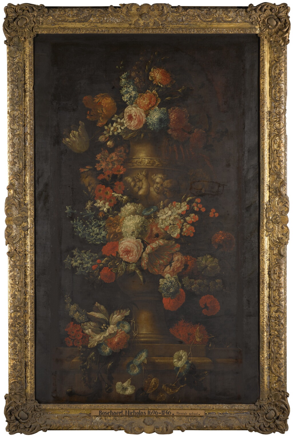 View full screen - View 1 of Lot 34. JAN BAPTIST BOSSCHAERT | Still life of flowers including tulips, roses, and turban rannunuculous, in a stone urn decorated with putti, all on a stone ledge.