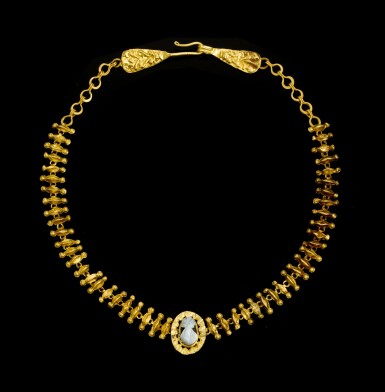 View full screen - View 1 of Lot 6. A ROMAN GOLD NECKLACE WITH A SARDONYX CAMEO PORTRAIT BUST, CIRCA 3RD CENTURY A.D..