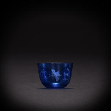 View full screen - View 1 of Lot 5862. A blue glass 'butterfly' cup, Mark and period of Tongzhi | 清同治 藍料花蝶紋小盃 《同治年製》款.