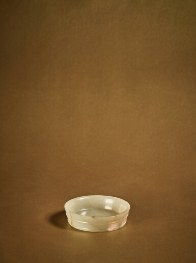 View full screen - View 1 of Lot 127. A small pale celadon jade washer, Song dynasty .