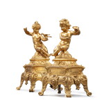 Paire de chenets aux enfants en bronze redoré d’époque Régence, vers 1720